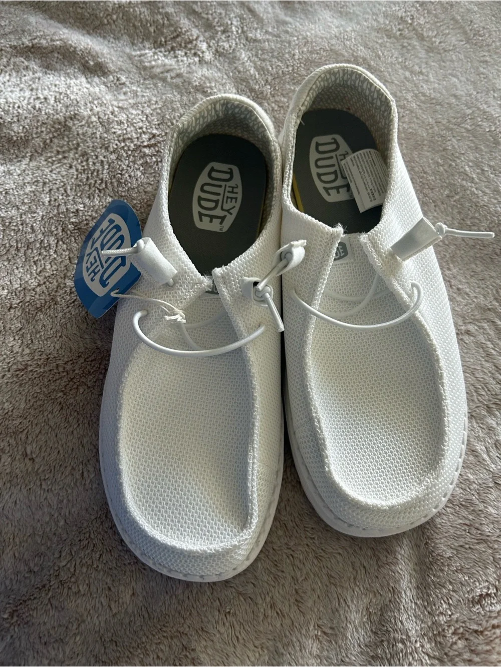 Hey Dude ladies White Slip-On Knit Sneakers. New with tags. W9